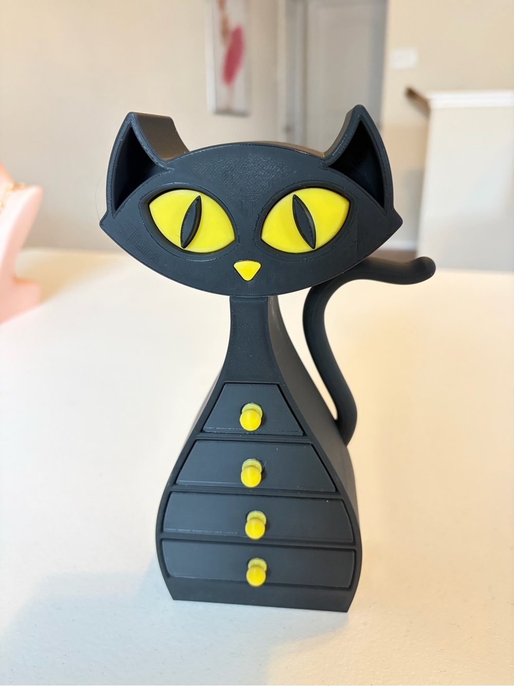 3D Printed Black & Yellow Cat Jewelry Organizer.
